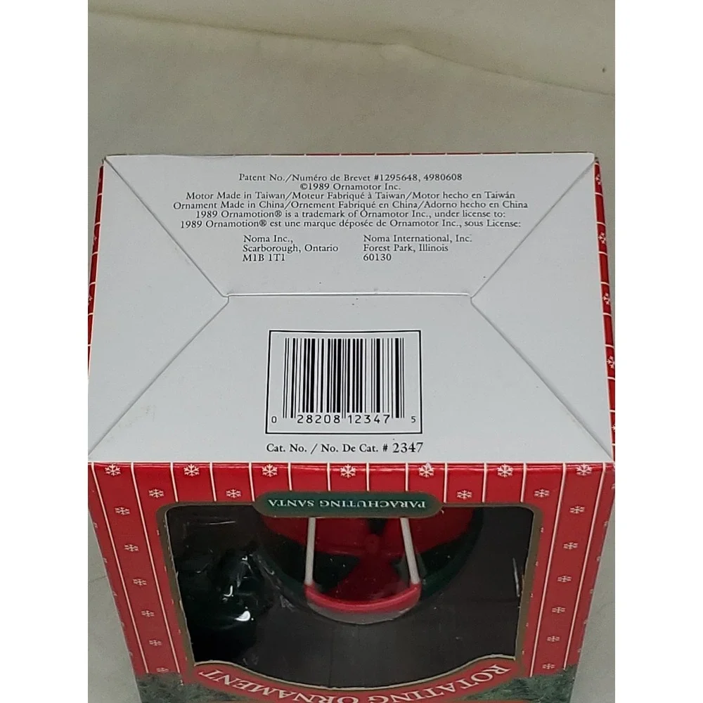 Vntg. 1989 Noma OrnaMotion Parachuting Santa‎ Rotating Ornament #1295648 (#2347)